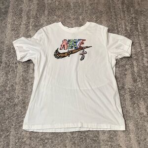 Nike Fantasy Futura HBR T-shirt in white with a whimsical "Nike" Swoosh